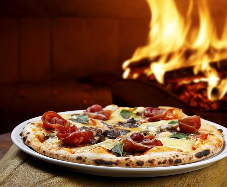 Real Wood-Fired Pizza freshly prepared wood-fired pizza in our oven in Kent
